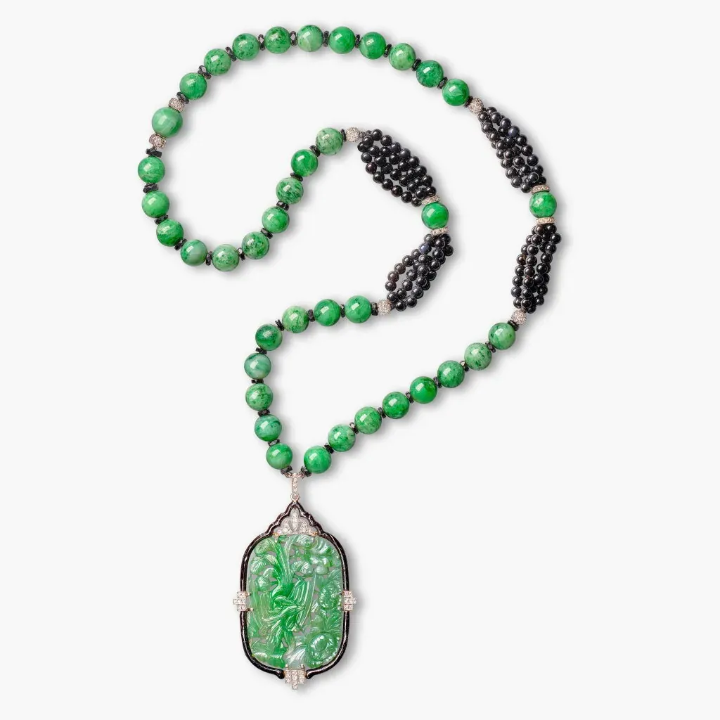 Cartier Jadeite, Onyx, Enamel and Diamond Pendent Necklace, Circa 1925